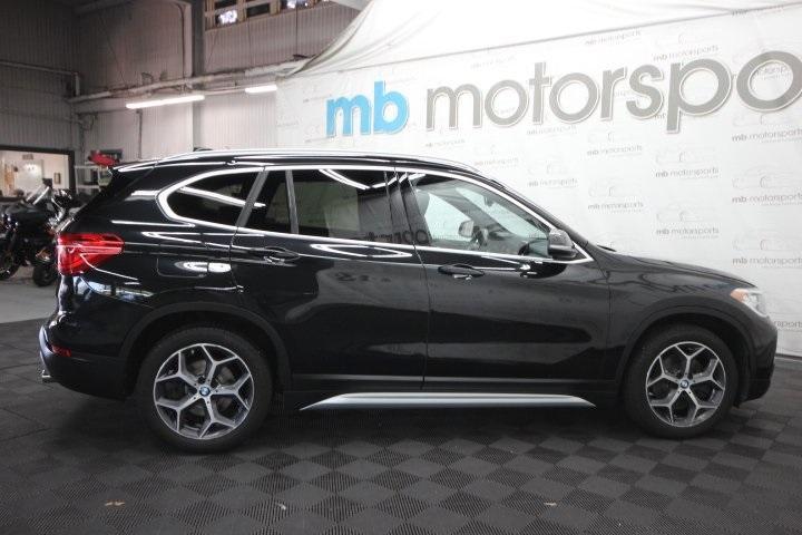 used 2018 BMW X1 car, priced at $13,995
