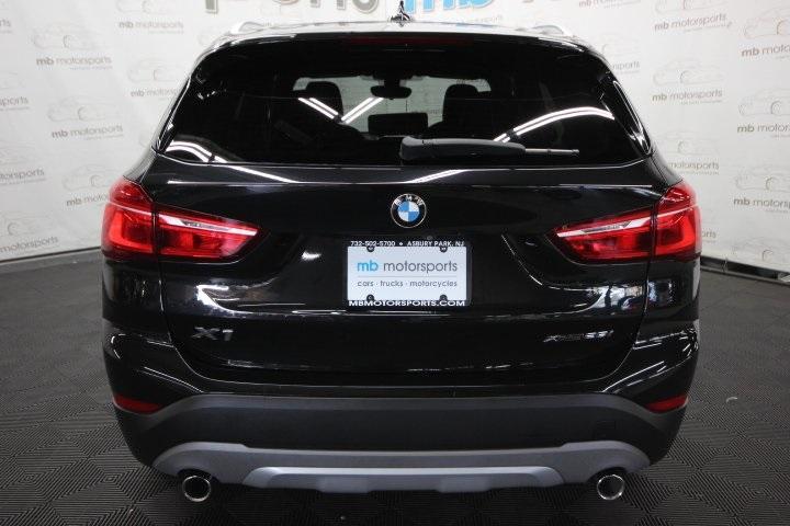 used 2018 BMW X1 car, priced at $13,995