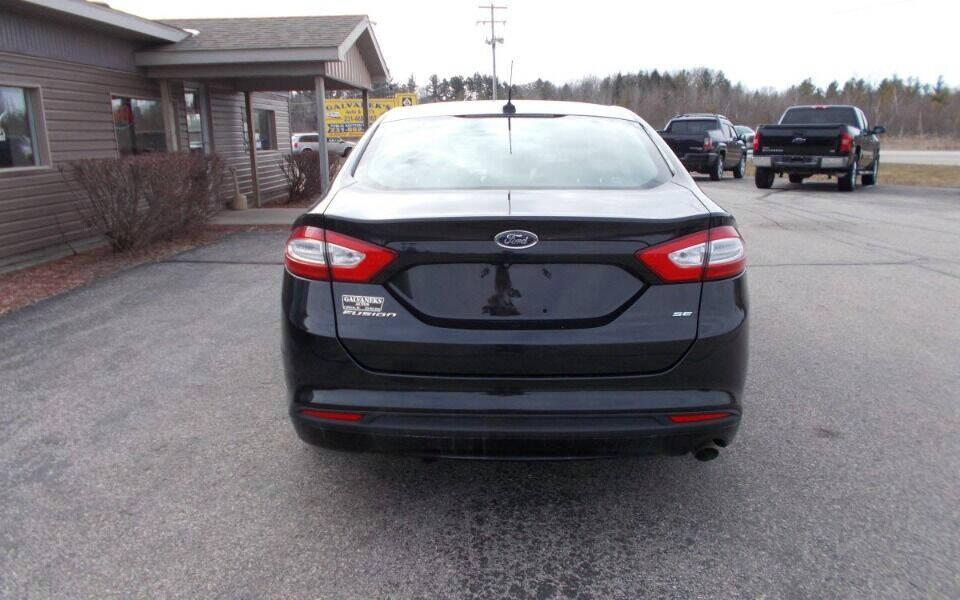 used 2015 Ford Fusion car, priced at $7,990