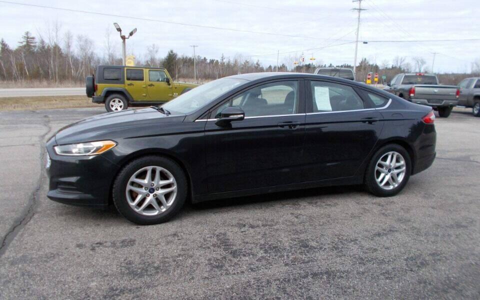 used 2015 Ford Fusion car, priced at $7,990