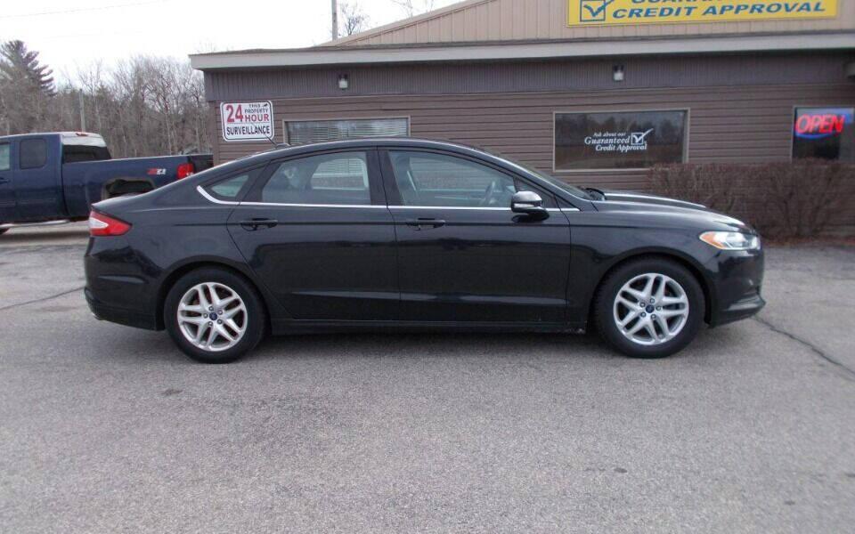 used 2015 Ford Fusion car, priced at $7,990