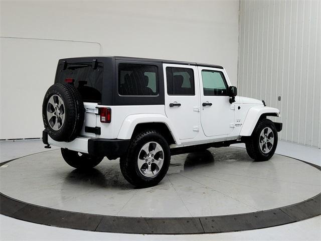 used 2016 Jeep Wrangler Unlimited car, priced at $21,997