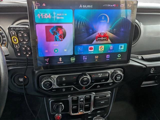 used 2021 Jeep Wrangler Unlimited car, priced at $29,897