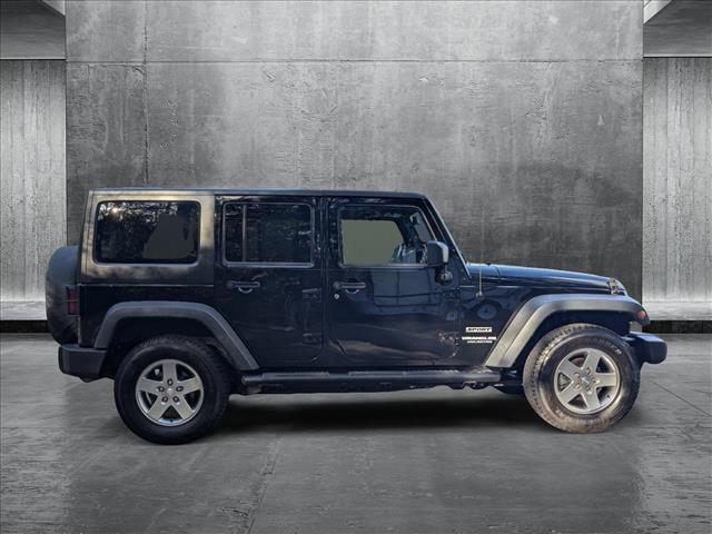 used 2016 Jeep Wrangler Unlimited car, priced at $18,587