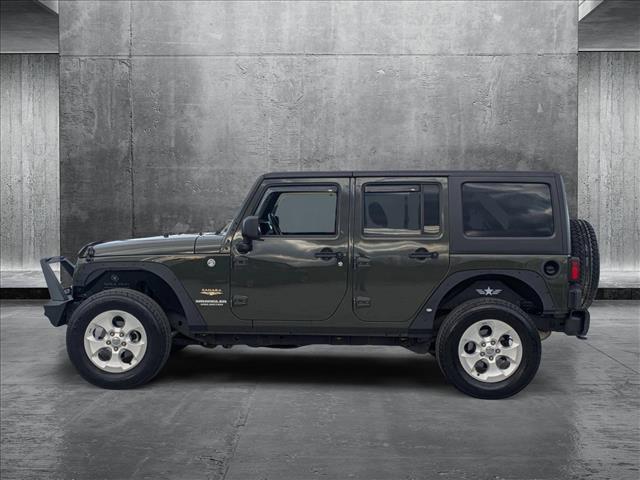 used 2015 Jeep Wrangler Unlimited car, priced at $20,992