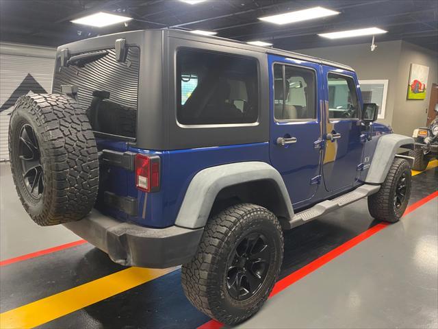 used 2009 Jeep Wrangler Unlimited car, priced at $13,995