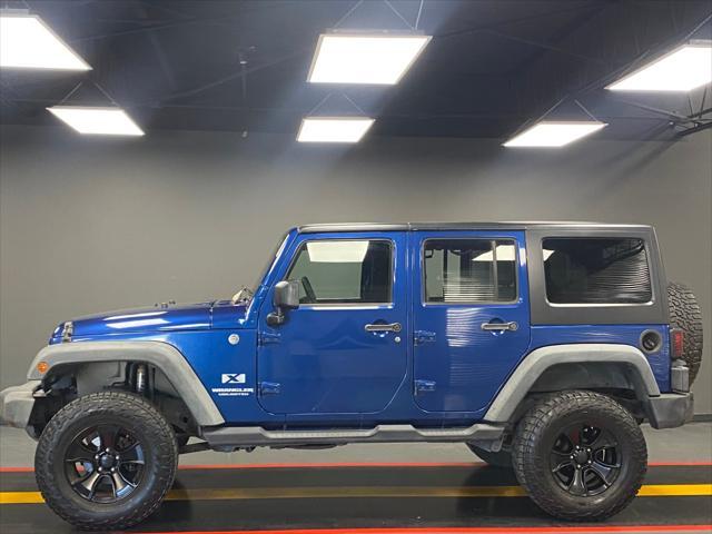 used 2009 Jeep Wrangler Unlimited car, priced at $13,995