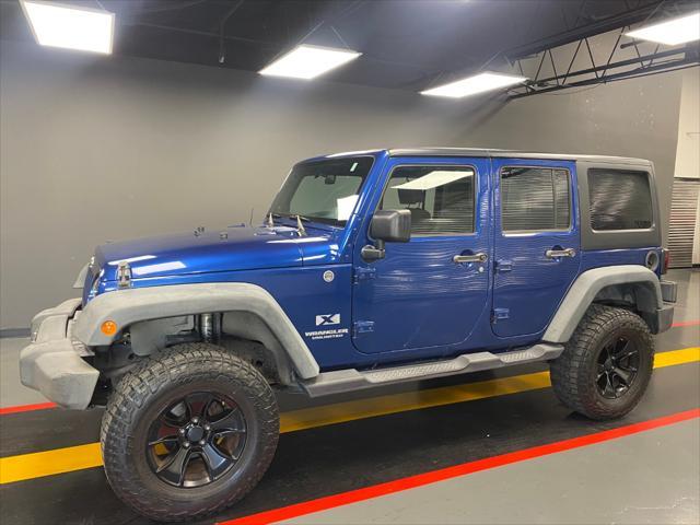 used 2009 Jeep Wrangler Unlimited car, priced at $13,995