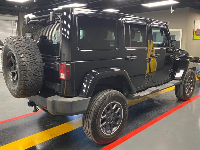 used 2011 Jeep Wrangler Unlimited car, priced at $15,995