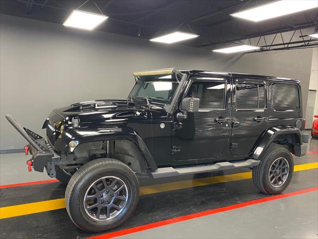 used 2011 Jeep Wrangler Unlimited car, priced at $15,995