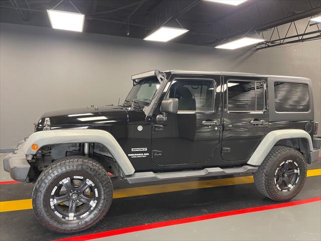 used 2012 Jeep Wrangler Unlimited car, priced at $12,850