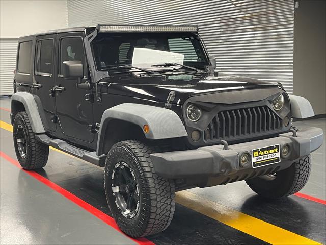 used 2012 Jeep Wrangler Unlimited car, priced at $12,850