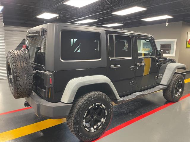 used 2012 Jeep Wrangler Unlimited car, priced at $12,850