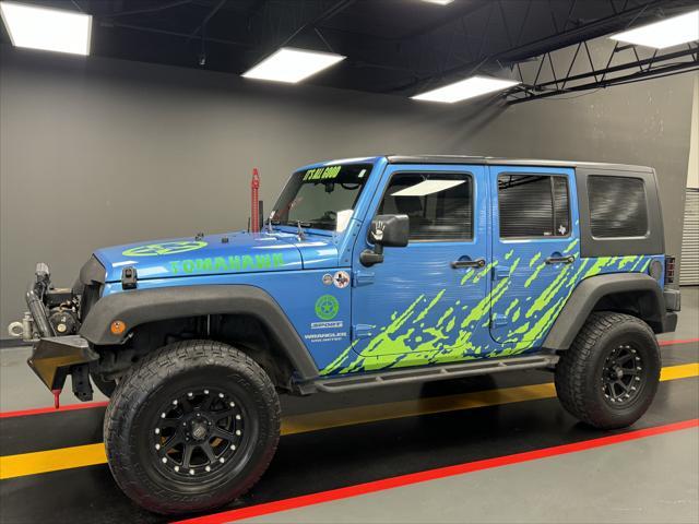 used 2010 Jeep Wrangler Unlimited car, priced at $16,850