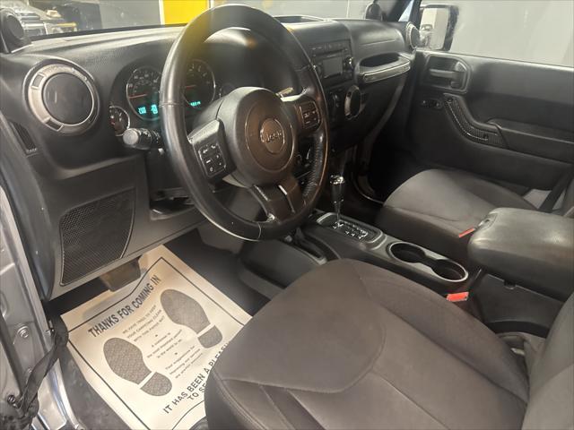 used 2014 Jeep Wrangler Unlimited car, priced at $12,995