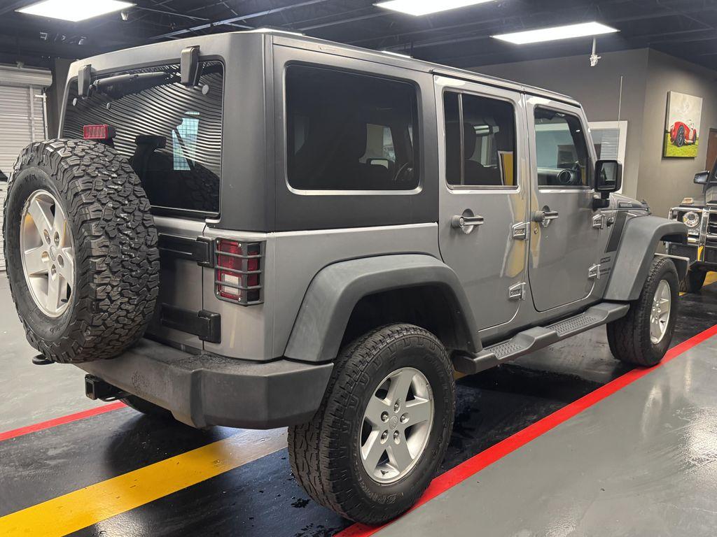 used 2014 Jeep Wrangler Unlimited car, priced at $10,999