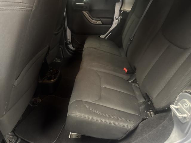 used 2014 Jeep Wrangler Unlimited car, priced at $12,995
