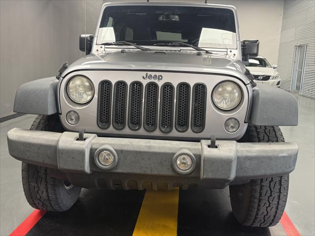 used 2014 Jeep Wrangler Unlimited car, priced at $12,995