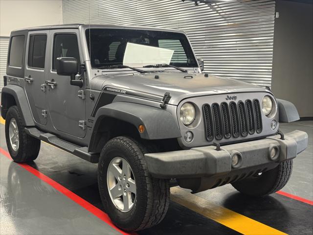 used 2014 Jeep Wrangler Unlimited car, priced at $12,995