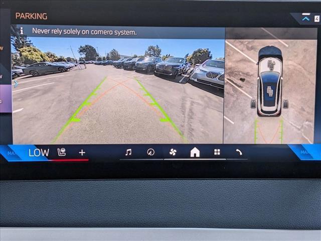 new 2026 BMW iX car, priced at $82,345