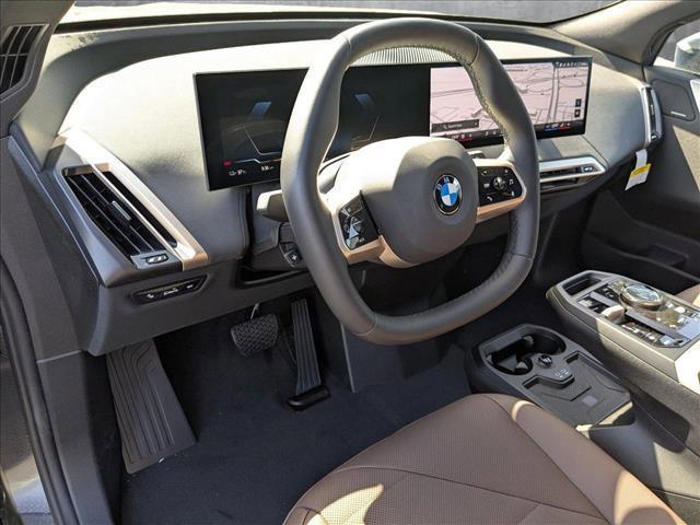 new 2026 BMW iX car, priced at $83,945