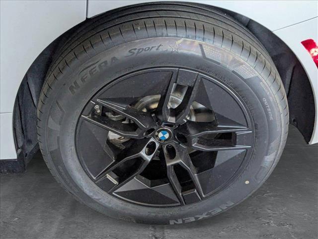new 2026 BMW iX car, priced at $82,325