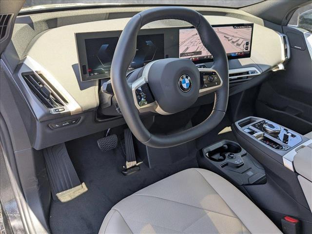 new 2026 BMW iX car, priced at $97,195