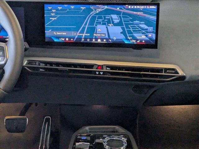 new 2026 BMW iX car, priced at $118,045