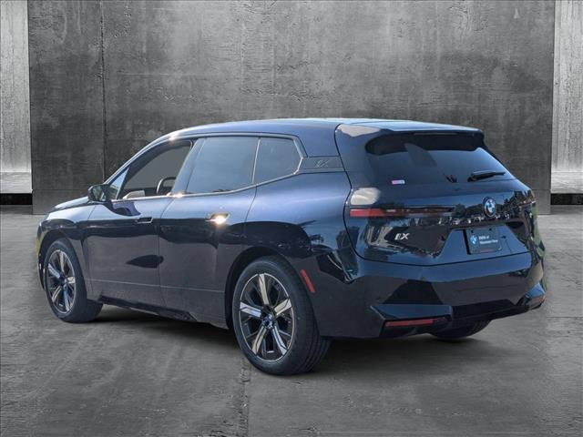 new 2026 BMW iX car, priced at $90,095