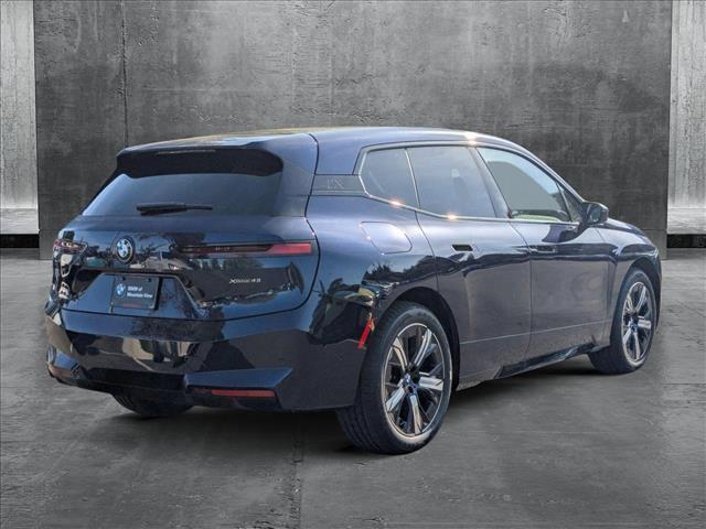 new 2026 BMW iX car, priced at $90,095