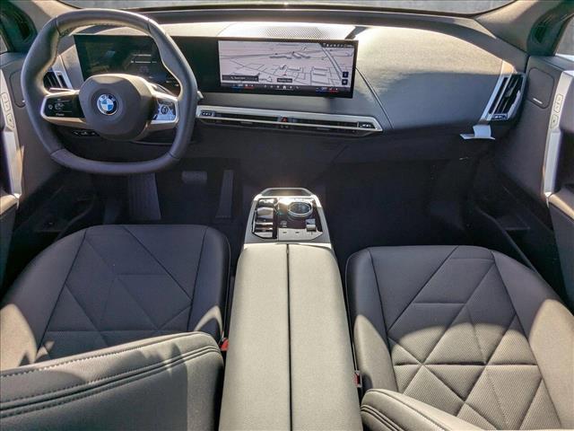 new 2026 BMW iX car, priced at $90,095