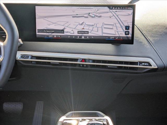 new 2026 BMW iX car, priced at $90,095
