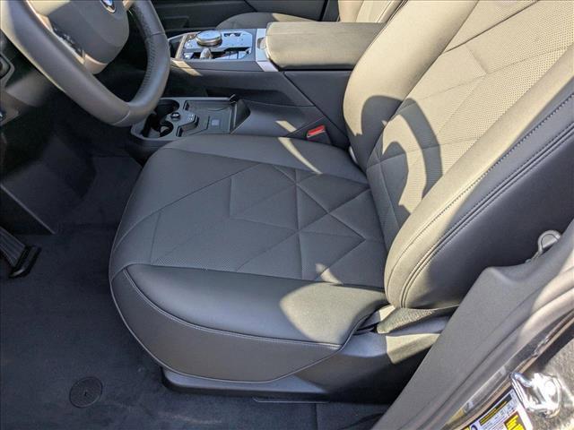 new 2026 BMW iX car, priced at $90,095