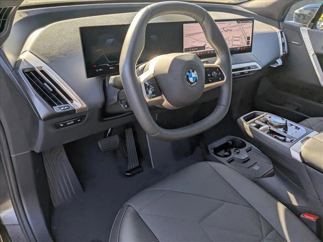 new 2026 BMW iX car, priced at $90,095