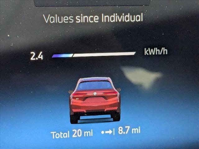 new 2026 BMW iX car, priced at $97,425