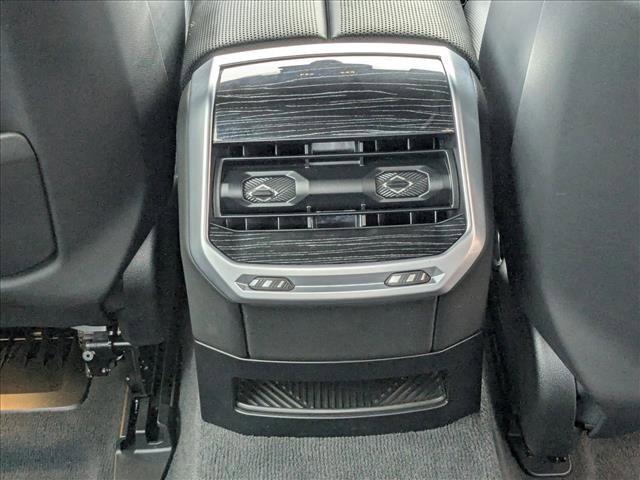 used 2023 BMW 740 car, priced at $63,455