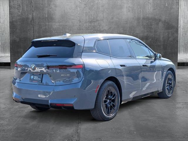 new 2026 BMW iX car, priced at $85,095