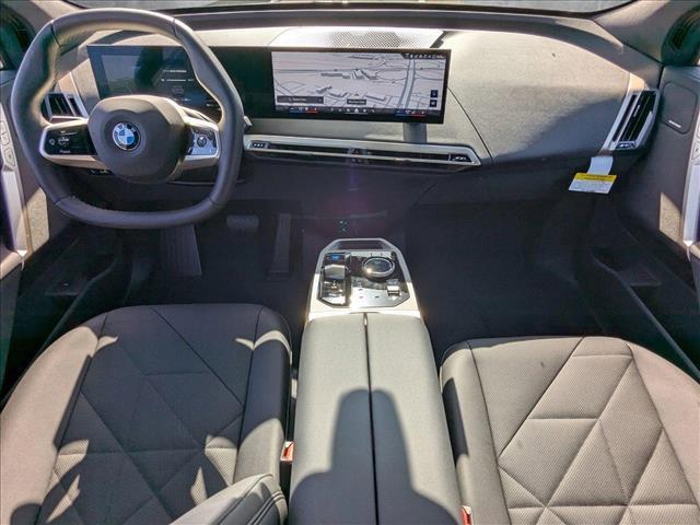 new 2026 BMW iX car, priced at $85,095