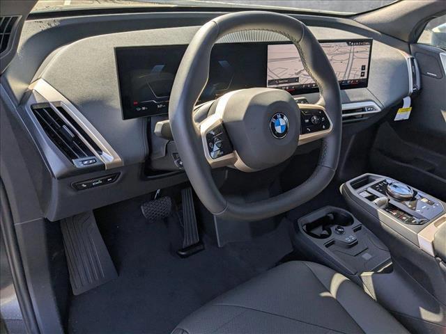 new 2026 BMW iX car, priced at $85,095