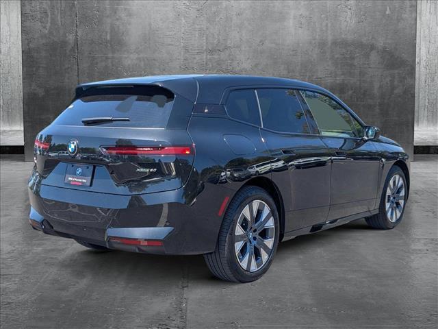 new 2026 BMW iX car, priced at $98,875