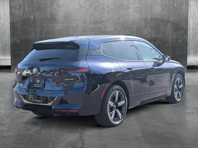 new 2026 BMW iX car, priced at $99,145