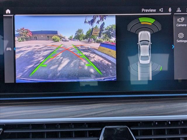 used 2023 BMW 530e car, priced at $39,455