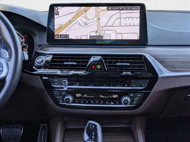 used 2023 BMW 530e car, priced at $39,455