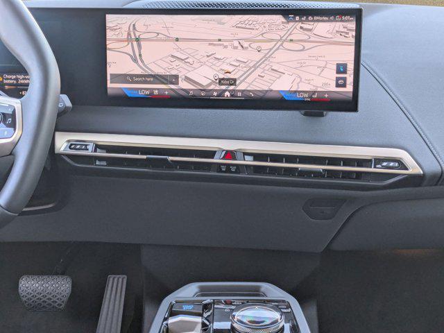 new 2026 BMW iX car, priced at $84,945