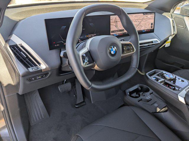 new 2026 BMW iX car, priced at $84,945