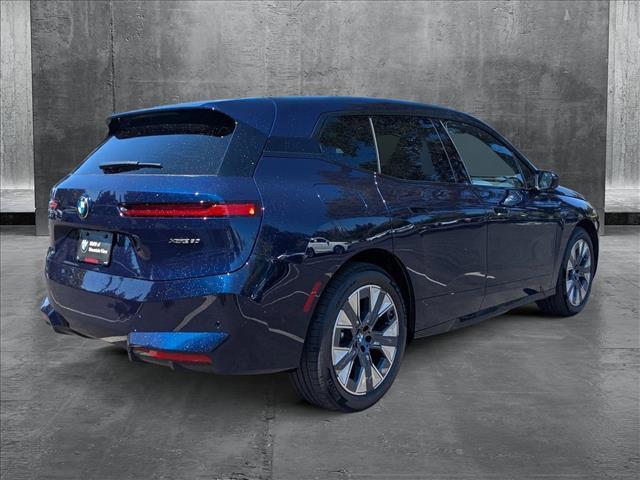 new 2026 BMW iX car, priced at $99,145