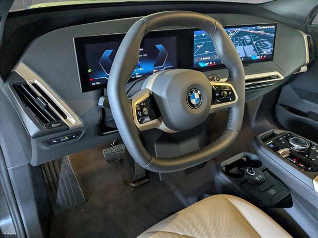 new 2026 BMW iX car, priced at $99,145