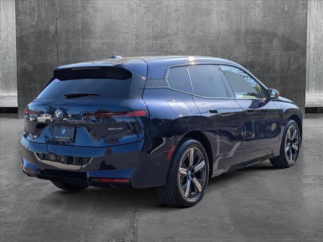 new 2026 BMW iX car, priced at $85,895