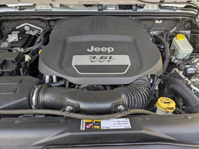 used 2013 Jeep Wrangler Unlimited car, priced at $17,455