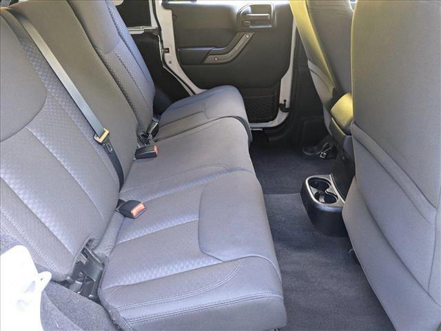 used 2013 Jeep Wrangler Unlimited car, priced at $17,455